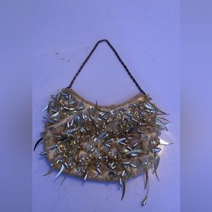 Beaded golden clutch bag